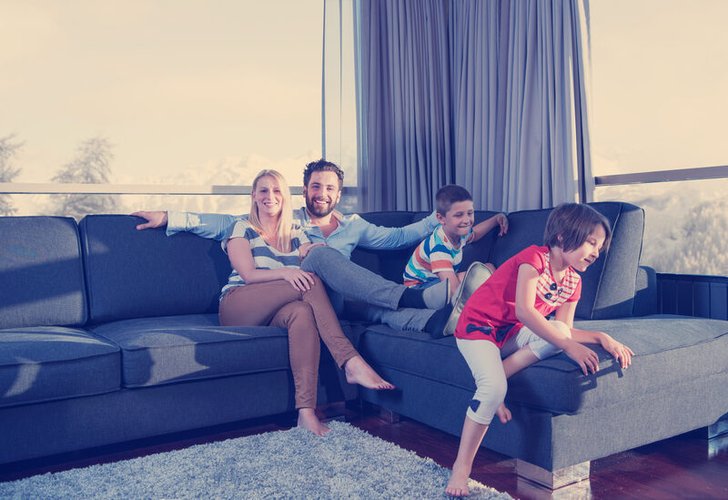 Family enjoying time together on the couch